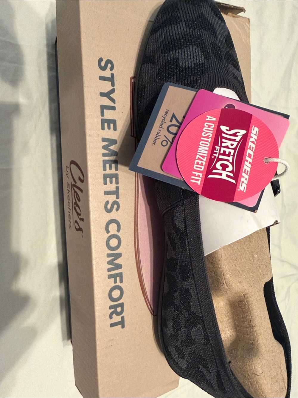 Skechers Women's Black Slip-On Stretch Flats with Subtle Pattern
